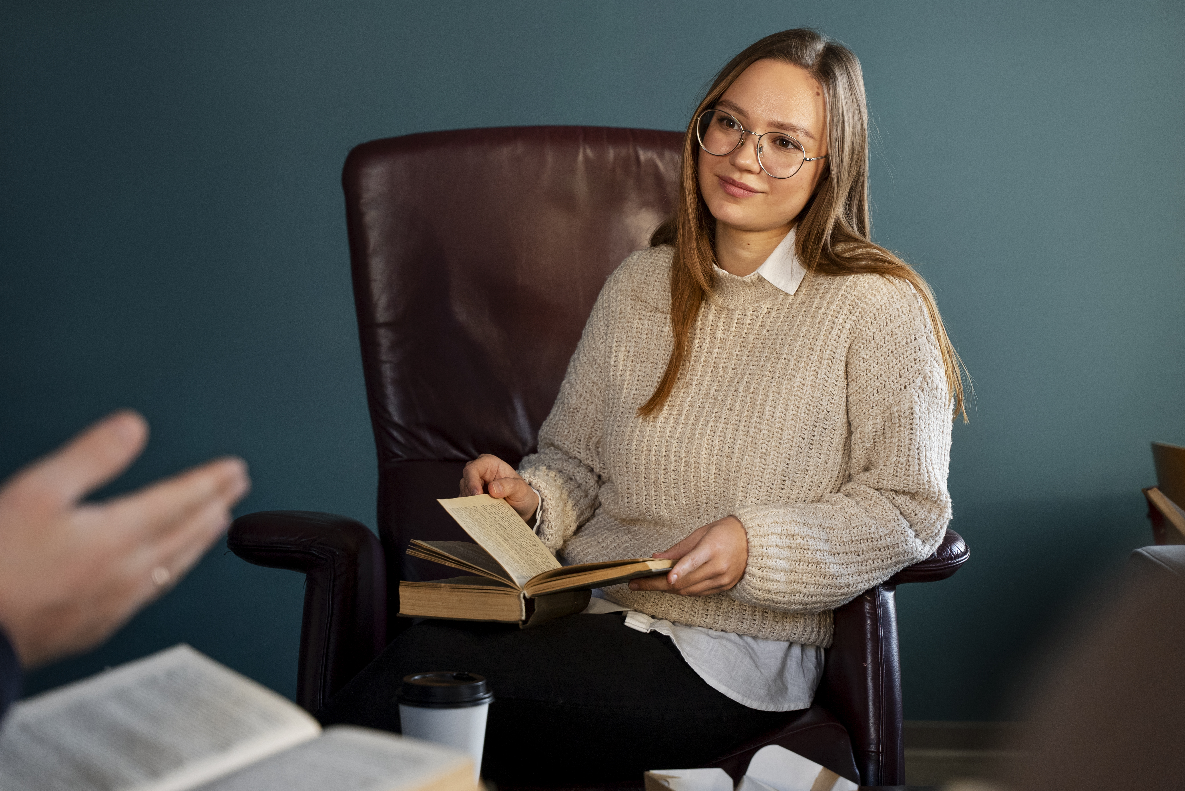 front-view-woman-sitting-chair.jpg