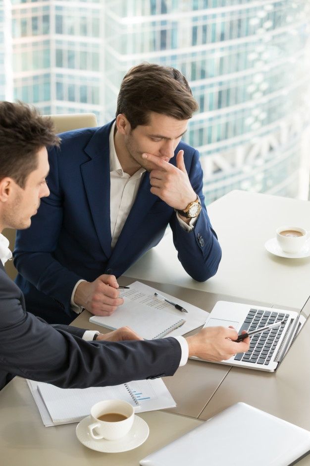 Education and psychology professionals collaborating in a postgraduate academic setting